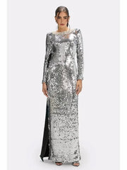 Full-length front view of a silver sequin sheath maxi dress with long sleeves and clean O-neckline on a studio background.