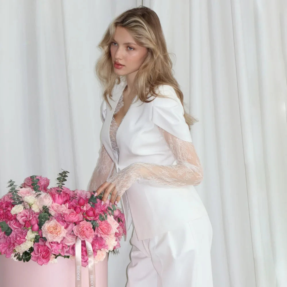 Single-button blazer with structured shoulders and clean tailoring