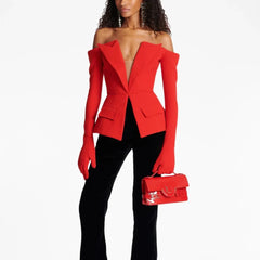 Slash-neck tailored red blazer styled for evening wear