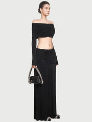 Off-shoulder slash-neck long sleeve top paired with an ankle-length skirt