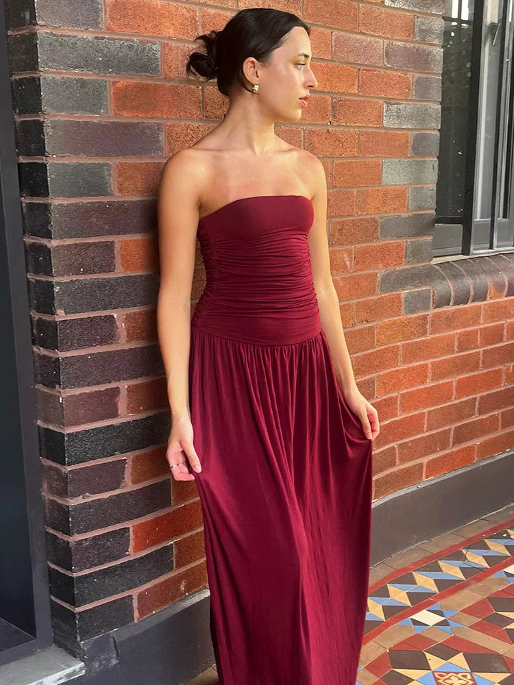 Sleek red carpet strapless gown for modern parties and city nights