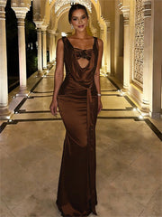 Formal sleeveless gown featuring a flowing silhouette and natural waist