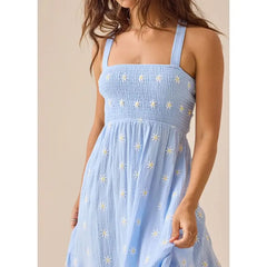 Sleeveless light blue dress perfect for vacations and holidays