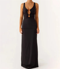 Black evening gown with a plunging neckline on a white background