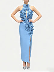 Front-facing silhouette showing the sleeveless cut and refined front slit of the long dress