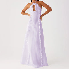 A front view of the sleeveless fairycore-style dress, showing the ruffles.