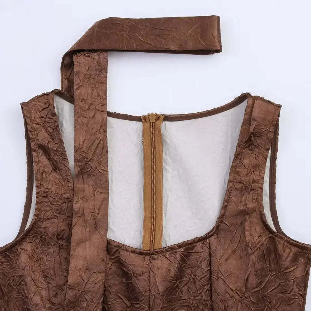 Fit and flare brown midi dress designed for chic autumn occasions