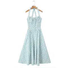 Romantic women’s floral midi dress styled for summer
