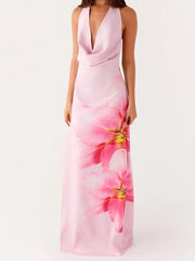 The dress showing the sheath silhouette and sleeveless design.