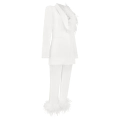 Full outfit view showing the slim silhouette, structured fit, and coordinated tailoring from head to toe