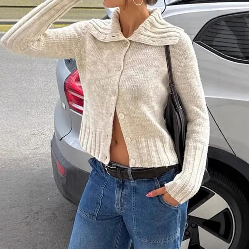 The slim fit cardigan styled for an elegant office outfit.