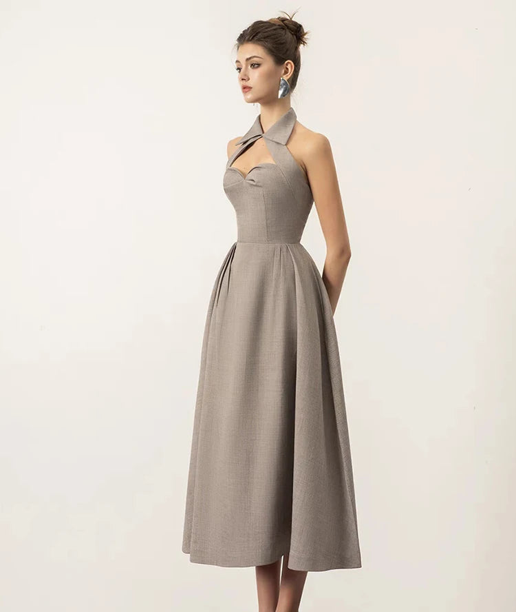 The slim fit of the dress, highlighting its flattering silhouette.