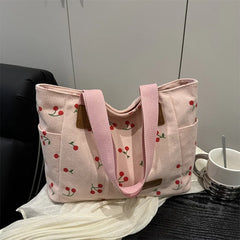 Soft corduroy handbag with zipper and cherry accents