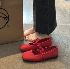 Women’s satin Mary Jane shoes in red and black color options