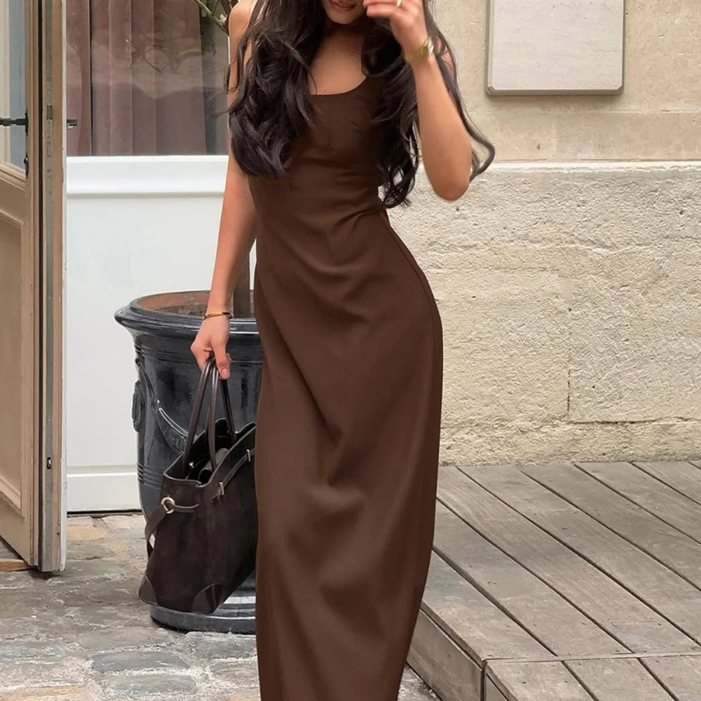Spaghetti strap brown vintage dress for event-ready city looks