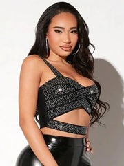 Sparkling black crop top featured on model for night-out inspiration