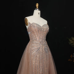 Sparkling crystal beaded formal gown for women’s gala occasions on a mannequin against a dark background