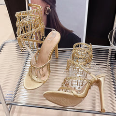 Elegant slip-on golden heels with sparkle detail