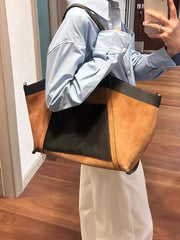 Modern basket-style tote bag with single shoulder strap