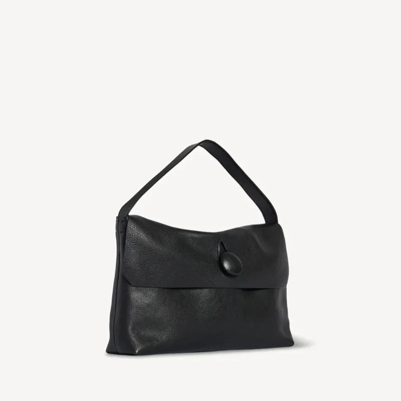 women’s flap shoulder bag with soft structure and clean design