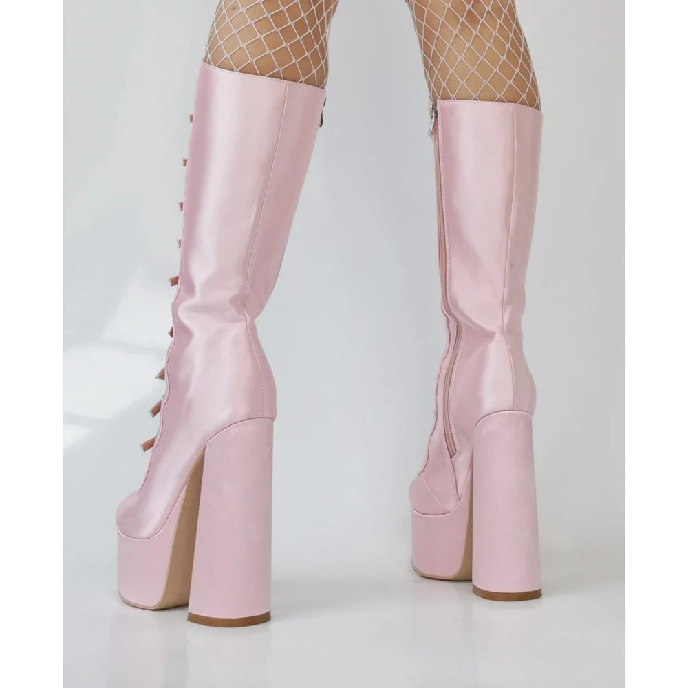 Tall platform boots with wrap strap structure