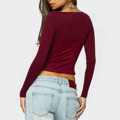 Square neck cropped autumn top paired with wide-leg denim