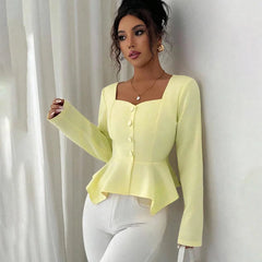 A woman modeling a square-neck ruched long-sleeve T-shirt.