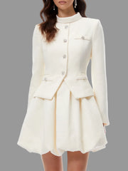 A-line mini dress featuring sculpted hem and stand collar styled against a soft background