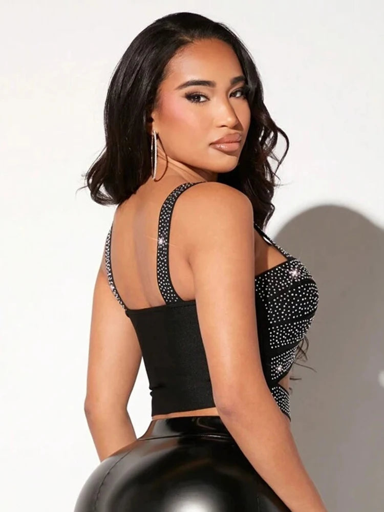 Statement bandage top with rhinestones shown for women’s bold fashion

