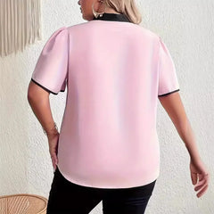 Statement bow office blouse paired for day-to-night transitions