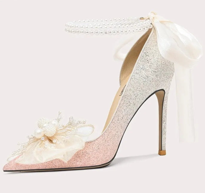Statement bow wedding shoes for women with luxury floral details