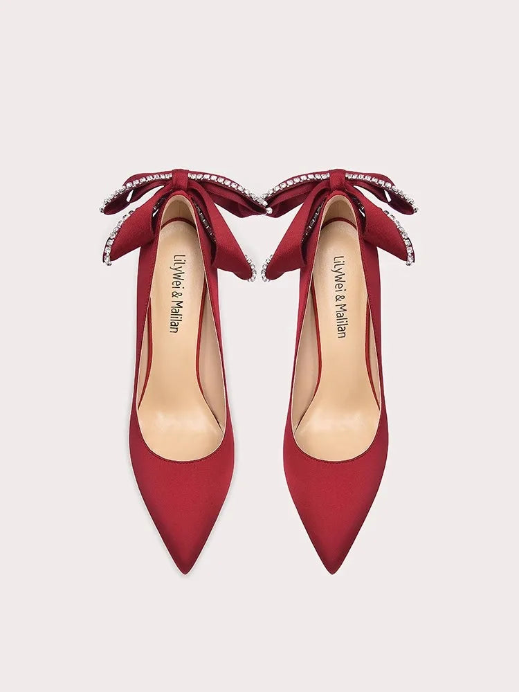 Statement red stiletto party pumps with oversized bow and pearls