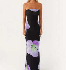View of strapless maxi dress with floral print and curve-hugging fit