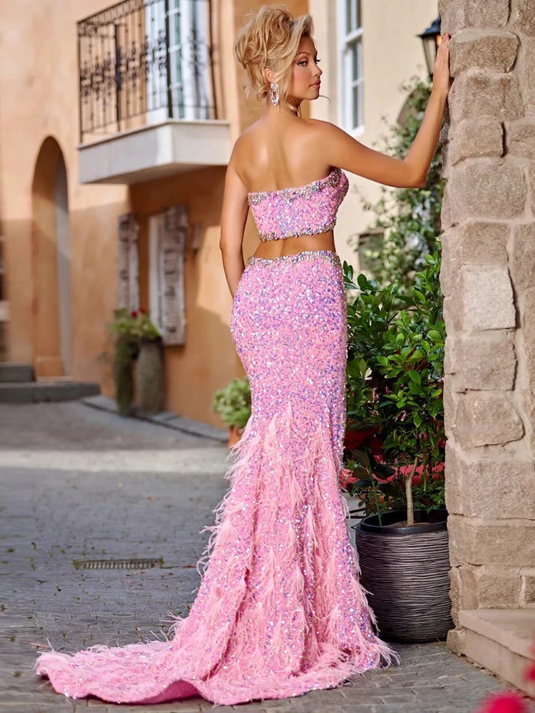 Strapless pink high slit evening dress photographed for statement fashion