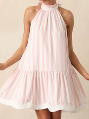 A front view of the striped velvet dress, showing the fabric and pattern.