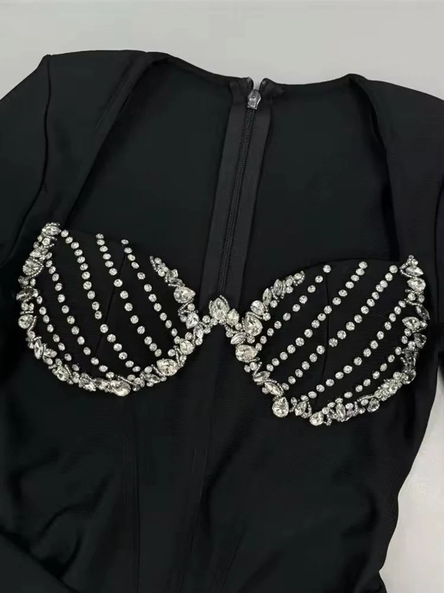 Refined black midi dress with a sculpted silhouette