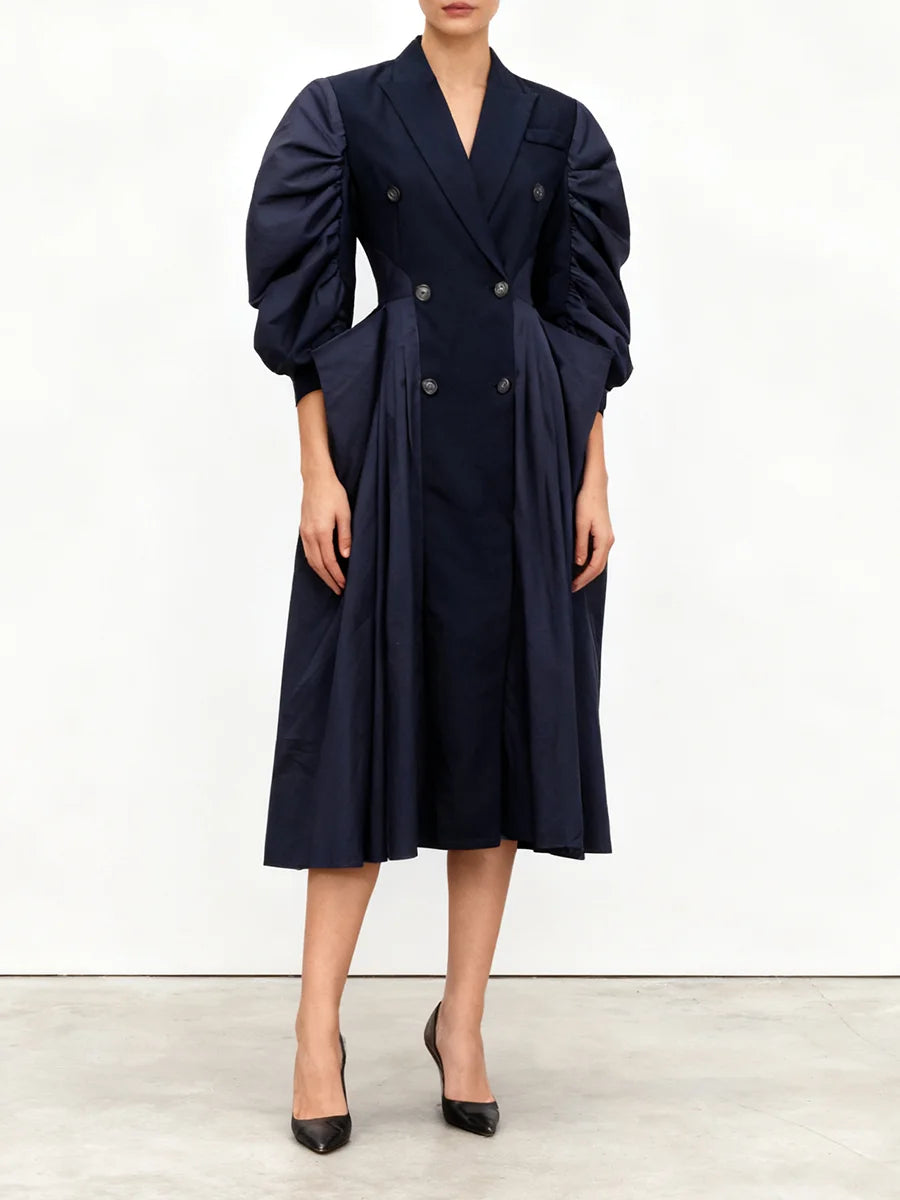 Elegant blue dress with half puff sleeves and refined pleating