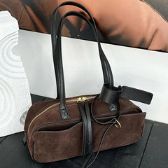 Deep brown box shoulder bag with long handles and gold-tone hardware accents