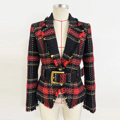 Long sleeve plaid blazer styled open at the neckline, showcasing sharp shoulders and a tailored silhouette with textured tweed-like fabric