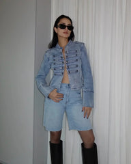 Structured short jacket showing the collar and fabric texture