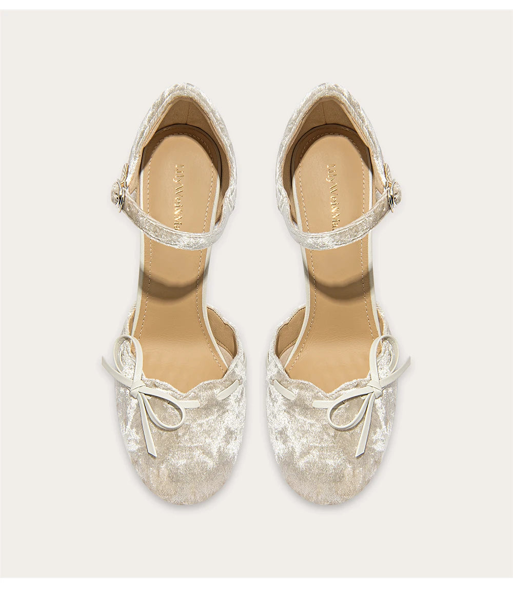 Party-ready suede stiletto sandals with rhinestone bowknot