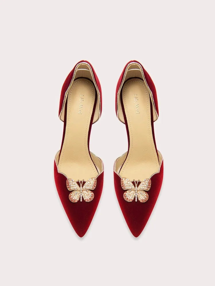 Pointed suede sandals with rhinestone butterfly detail