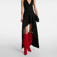 Red pointed high heel boots with tassel detailing