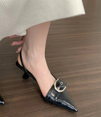 Close-up of pointed toe low heel sandals with adjustable strap