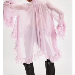 Flowy long sleeve sheer top with tie detail and delicate cuff volume