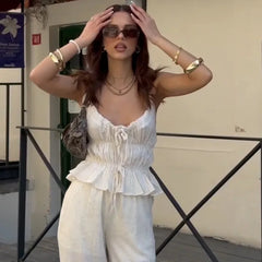Pleated bow sleeveless crop top and wide-leg pants co ord