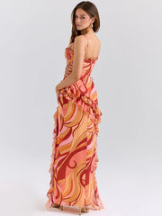 Sunset swirls party maxi dress in vibrant colors with ruffles