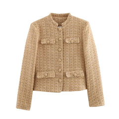 Tailored beige jacket paired with blue jeans for everyday style