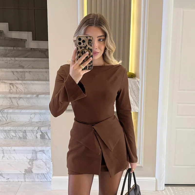Asymmetric skirt layer detail on a long sleeve mini dress in brown