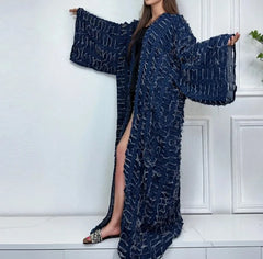 Casual streetwear look styled with bohemian long denim coat